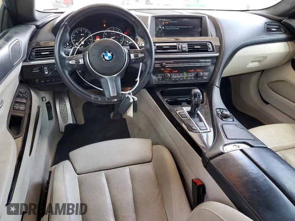 2014 BMW 6 Series 640i z VIN WBA6A0C5XED317733, wystawiony jako Copart lot #51289785 z przebiegiem 120 455 mil mil oraz Szkoda całkowita • Salvage title. Historia ofert i sprzedaży dostępna na DreamBid. Obrazek 8.