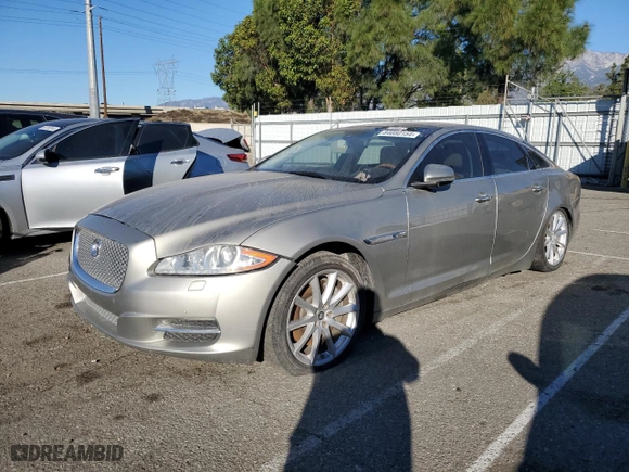 2013 Jaguar XJ with VIN SAJWA1C73D8V57984, listed as a Copart auction lot 84050154 with NaN miles and Clean Title. Bid and sale history available at carsss.com. Image 1.