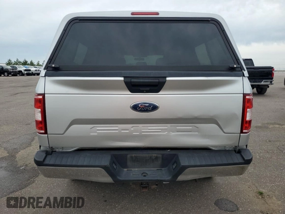 2019 Ford F-150 XL with VIN 1FTEW1E54KFA20203, listed as a Copart auction lot 64373765 with 79,550 mi miles and Salvage title. Bid and sale history available at DreamBid. Image 6.