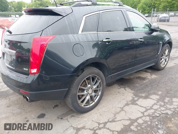 2013 Cadillac SRX Performance Collection z VIN 3GYFNHE39DS642111, wystawiony jako IAAI lot #42470291 z przebiegiem 176 239 mil mil oraz . Historia ofert i sprzedaży dostępna na DreamBid. Obrazek 4.