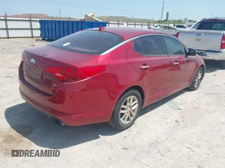 2013 Kia Optima LX with VIN 5XXGM4A7XDG247696, listed as a IAAI auction lot 42013026 with 119,209 mi miles. Bid and sale history available at carsss.com. Image 4.