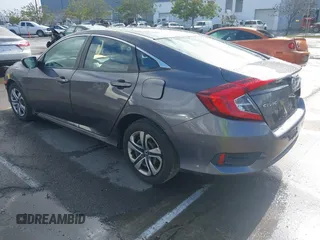 2017 Honda Civic LX z VIN 2HGFC2F50HH540361, wystawiony jako IAAI lot #41809159 z przebiegiem 96 590 mil mil oraz . Historia ofert i sprzedaży dostępna na DreamBid. Obrazek 3.