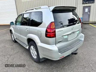 2003 Lexus GX 470 z VIN JTJBT20X130004567, wystawiony jako Copart lot #57682615 z przebiegiem 237 809 mil mil oraz Szkoda całkowita • Salvage title. Historia ofert i sprzedaży dostępna na DreamBid. Obrazek 3.