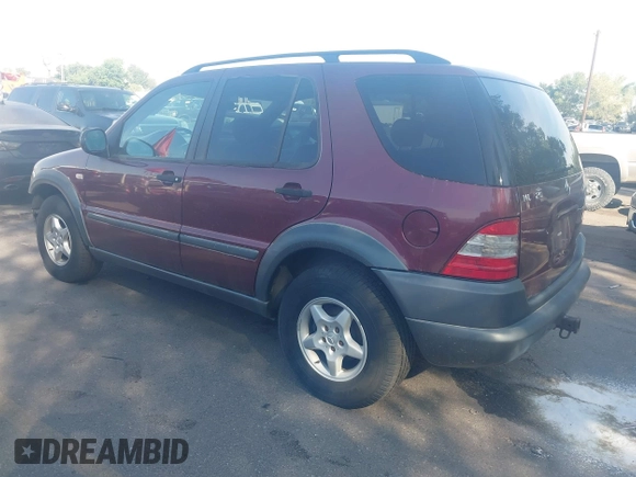 1999 Mercedes-Benz M 320/430/500 with VIN 4JGAB54E5XA127036, listed as a IAAI auction lot 42587793 with 131,129 mi miles and . Bid and sale history available at DreamBid. Image 3.
