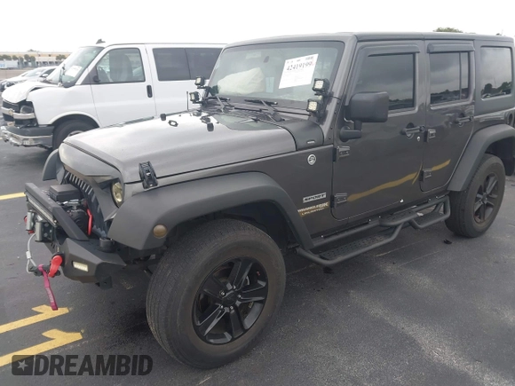 2018 Jeep Wrangler Unlimited Sport S with VIN 1C4BJWDG1JL810754, listed as a IAAI auction lot 42419199 with 74,901 mi miles and . Bid and sale history available at DreamBid. Image 17.