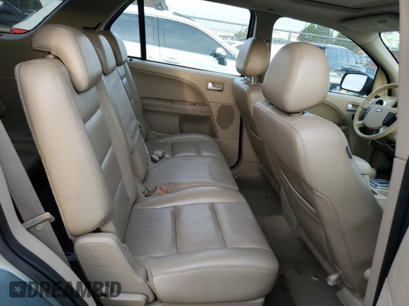 2005 Ford Freestyle Limited with VIN 1FMDK06105GA71334, listed as a Copart auction lot 74270784 with 56,228 mi miles and Salvage Title. Bid and sale history available at carsss.com. Image 11.