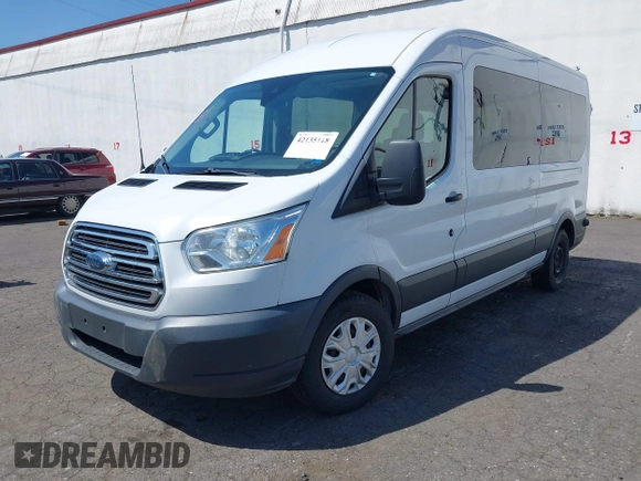 2015 Ford Transit Passenger XL z VIN 1FBAX2CG7FKA75719, wystawiony jako IAAI lot #42135118 z przebiegiem Nie podano mil oraz . Historia ofert i sprzedaży dostępna na DreamBid. Obrazek 22.