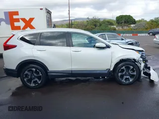 2018 Honda CR-V Touring with VIN 2HKRW1H96JH506435, listed as a IAAI auction lot 41228873 with 11,585 mi miles and . Bid and sale history available at DreamBid. Image 14.