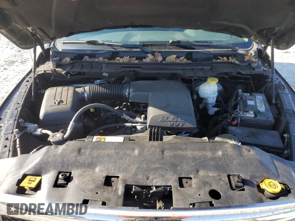2018 Ram 1500 Express z VIN 3C6RR6KG1JG246621, wystawiony jako Copart lot #85450824 z przebiegiem 125 449 mil mil oraz Szkoda całkowita • Salvage title. Historia ofert i sprzedaży dostępna na DreamBid. Obrazek 11.
