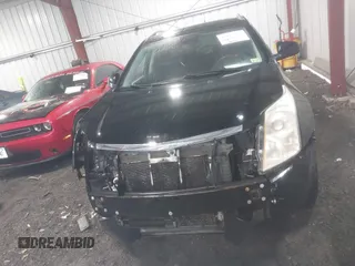 2010 Cadillac SRX Luxury Collection z VIN 3GYFNDEY2AS575786, wystawiony jako IAAI lot #41972117 z przebiegiem 124 331 mil mil oraz . Historia ofert i sprzedaży dostępna na DreamBid. Obrazek 13.