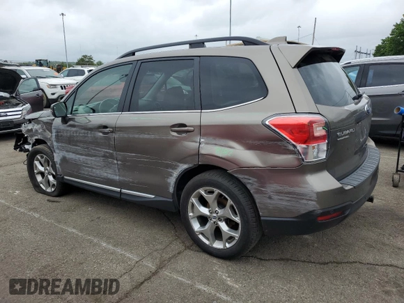 2018 Subaru Forester Touring with VIN JF2SJAWC9JH570189, listed as a Copart auction lot 57940935 with 76,574 mi miles and Salvage title. Bid and sale history available at DreamBid. Image 2.
