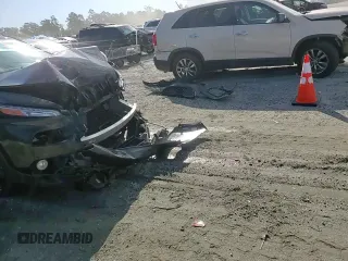 2016 Jeep Cherokee Limited z VIN 1C4PJLDB0GW350857, wystawiony jako Copart lot #58172455 z przebiegiem 120 885 mil mil oraz Szkoda całkowita • Salvage title. Historia ofert i sprzedaży dostępna na DreamBid. Obrazek 13.