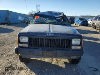1996 Jeep Cherokee Sport with VIN 1J4FJ68SXTL274898, listed as a Copart auction lot 87676505 with 258,358 mi miles and Salvage Title. Bid and sale history available at carsss.com. Image 5.