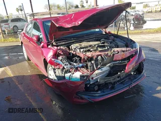 2020 Toyota Camry LE with VIN 4T1C11AK4LU916494, listed as a IAAI auction lot 41786429 with 100,032 mi miles and . Bid and sale history available at DreamBid. Image 6.