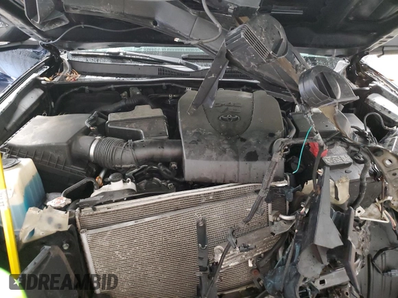 2019 Toyota Tacoma SR z VIN 5TFCZ5AN1KX196812, wystawiony jako Copart lot #51372065 z przebiegiem Nie podano mil oraz Szkoda całkowita • Salvage title. Historia ofert i sprzedaży dostępna na DreamBid. Obrazek 11.