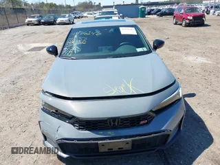 2025 Honda Civic Si with VIN 2HGFE1E54SH474457, listed as a IAAI auction lot 41978147 with 1,558 mi miles and . Bid and sale history available at DreamBid. Image 12.