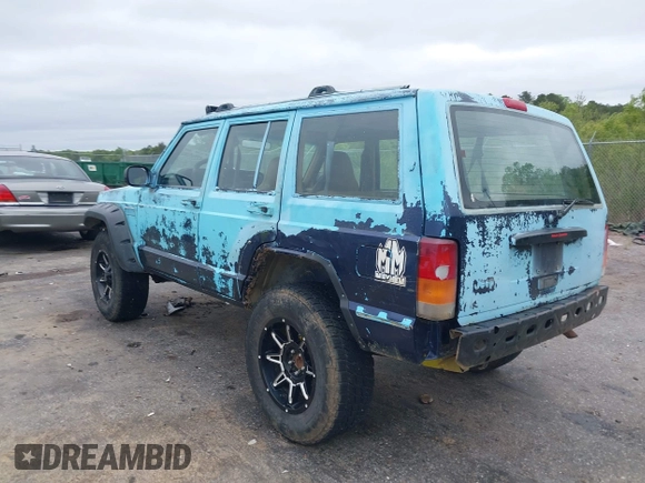 1997 Jeep Cherokee SE z VIN 1J4FJ28S3VL573144, wystawiony jako IAAI lot #41965201 z przebiegiem 298 276 mil mil oraz . Historia ofert i sprzedaży dostępna na DreamBid. Obrazek 3.