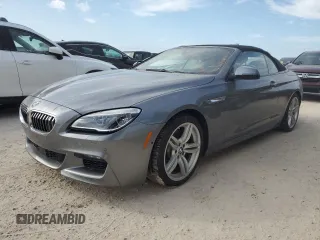 2016 BMW 6 Series z VIN WBA6F3C5XGD994576, wystawiony jako Copart lot #74617414 z przebiegiem Nie podano mil oraz Szkoda całkowita • Salvage title. Historia ofert i sprzedaży dostępna na DreamBid. Obrazek 1.