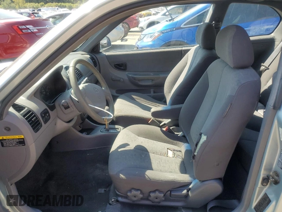2003 Hyundai Accent GL with VIN KMHCG35CX3U274974, listed as a Copart auction lot 68807494 with 133,791 mi miles and Non Repairable. Bid and sale history available at carsss.com. Image 7.