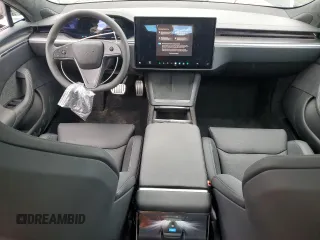 2024 Tesla Model S Plaid z VIN 5YJSA1E65RF543822, wystawiony jako Copart lot #48545205 z przebiegiem 2 473 mil mil oraz Szkoda całkowita • Salvage title. Historia ofert i sprzedaży dostępna na DreamBid. Obrazek 8.