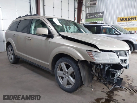 2010 Dodge Journey SXT with VIN 3D4PH5FVXAT180831, listed as a IAAI auction lot 41506328 with 155,482 mi miles. Bid and sale history available at carsss.com. Image 1.