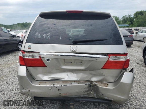 2006 Honda Odyssey Touring z VIN 5FNRL38886B000011, wystawiony jako Copart lot #57399225 z przebiegiem 256 217 mil mil oraz Szkoda całkowita • Salvage title. Historia ofert i sprzedaży dostępna na DreamBid. Obrazek 6.