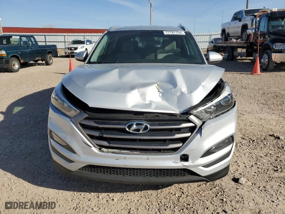 2016 Hyundai Tucson SE with VIN KM8J33A48GU110937, listed as a Copart auction lot 77781754 with 96,879 mi miles and Salvage Title. Bid and sale history available at carsss.com. Image 5.