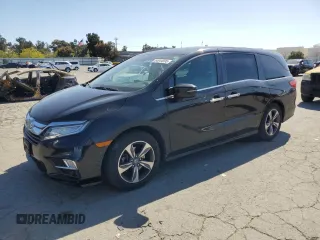 2018 Honda Odyssey Touring with VIN 5FNRL6H80JB065039, listed as a Copart auction lot 54944595 with 81,987 mi miles and Salvage Title. Bid and sale history available at carsss.com. Image 1.