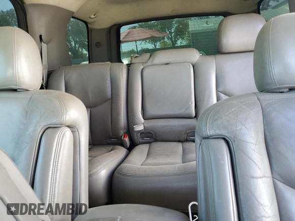 2003 GMC Yukon SLT with VIN 1GKEK13T83J116948, listed as a Copart auction lot 69048594 with 0 mi miles and Salvage Title. Bid and sale history available at carsss.com. Image 10.