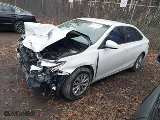 2016 Toyota Camry XLE with VIN 4T4BF1FK5GR574264, listed as a IAAI auction lot 41199585 with 106,933 mi miles. Bid and sale history available at carsss.com. Image 16.