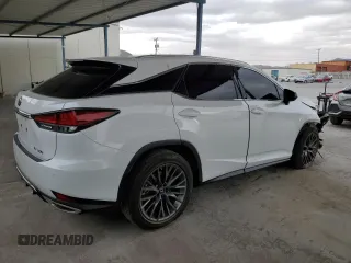 2020 Lexus RX with VIN 2T2YZMDA6LC250402, listed as a Copart auction lot 87664115 with 103,534 mi miles and Salvage Title. Bid and sale history available at carsss.com. Image 3.