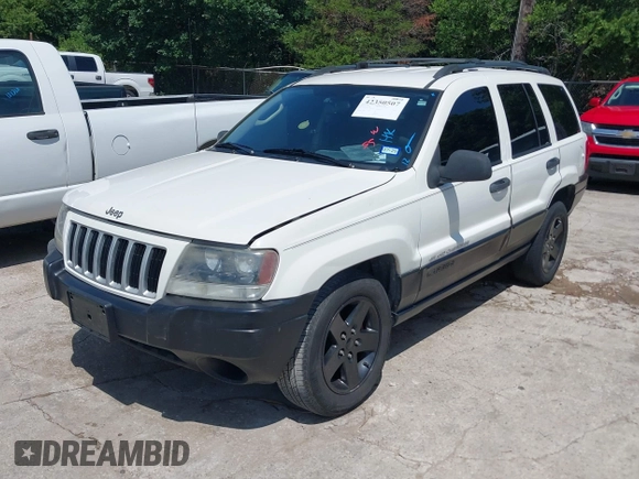 2004 Jeep Grand Cherokee Laredo z VIN 1J4GX48S74C152542, wystawiony jako IAAI lot #42350507 z przebiegiem 176 366 mil mil oraz . Historia ofert i sprzedaży dostępna na DreamBid. Obrazek 2.