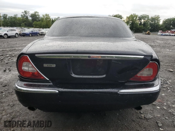 2004 Jaguar XJ with VIN SAJWA71C24SG33915, listed as a Copart auction lot 69626864 with 123,746 mi miles and Non Repairable. Bid and sale history available at carsss.com. Image 6.