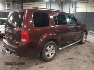 2009 Honda Pilot EX-L with VIN 5FNYF48569B021586, listed as a IAAI auction lot 41609721 with 291,598 mi miles. Bid and sale history available at carsss.com. Image 4.