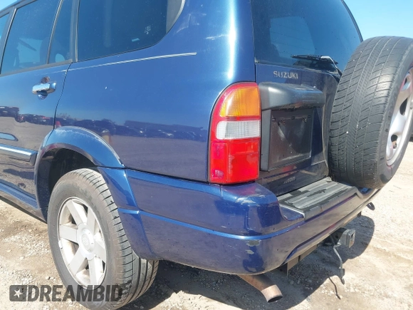 2003 Suzuki XL7 Touring z VIN JS3TX92V234104722, wystawiony jako IAAI lot #41994253 z przebiegiem 185 553 mil mil oraz . Historia ofert i sprzedaży dostępna na DreamBid. Obrazek 6.