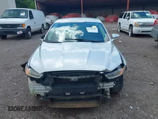 2014 Ford Fusion SE with VIN 3FA6P0H93ER299697, listed as a IAAI auction lot 42139387 with Not Provided miles and . Bid and sale history available at carsss.com. Image 6.