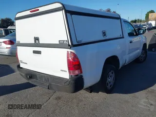 2014 Toyota Tacoma with VIN 5TFNX4CN6EX032823, listed as a IAAI auction lot 41711243 with 141,201 mi miles and . Bid and sale history available at DreamBid. Image 4.