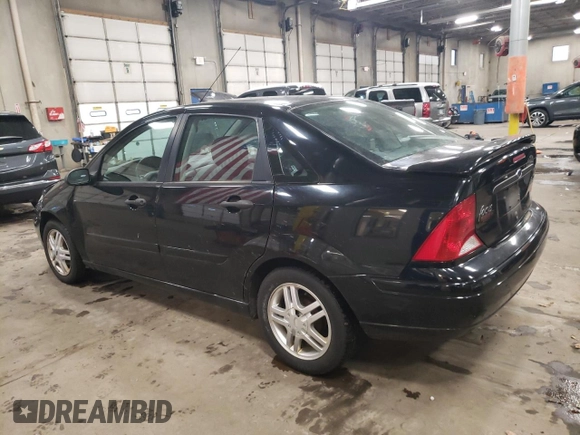 2000 Ford Focus with VIN 1FAHP3430YW406024, listed as a Copart auction lot 86580314 with 99,158 mi miles and Clean title. Bid and sale history available at DreamBid. Image 2.