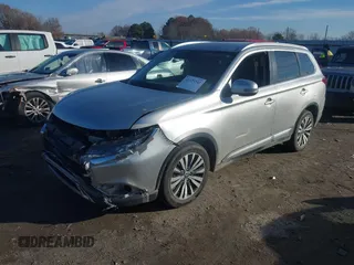 2020 Mitsubishi Outlander ES with VIN JA4AZ3A32LZ018238, listed as a IAAI auction lot 41129342 with 142,946 mi miles and . Bid and sale history available at DreamBid. Image 2.
