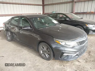 2019 Kia Optima LX z VIN 5XXGT4L37KG293349, wystawiony jako IAAI lot #42151650 z przebiegiem 112 469 mil mil oraz . Historia ofert i sprzedaży dostępna na DreamBid. Obrazek 1.