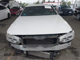 2016 BMW 4 Series 428i with VIN WBA3N7C54GK227752, listed as a IAAI auction lot 42003116 with 127,085 mi miles and . Bid and sale history available at DreamBid. Image 6.