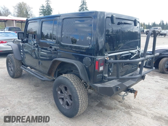 2014 Jeep Wrangler Unlimited Sahara with VIN 1C4BJWEG6EL107526, listed as a IAAI auction lot 42030244 with 69,077 mi miles. Bid and sale history available at carsss.com. Image 3.