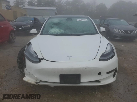 2021 Tesla Model 3 Performance with VIN 5YJ3E1ECXMF984417, listed as a Copart auction lot 48465675 with 60,838 mi miles and Clean Title. Bid and sale history available at DreamBid. Image 5.