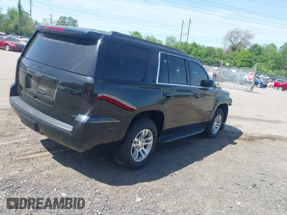 2020 Chevrolet Tahoe LT with VIN 1GNSKBKCXLR255963, listed as a IAAI auction lot 42127845 with 46,746 mi miles and . Bid and sale history available at DreamBid. Image 4.