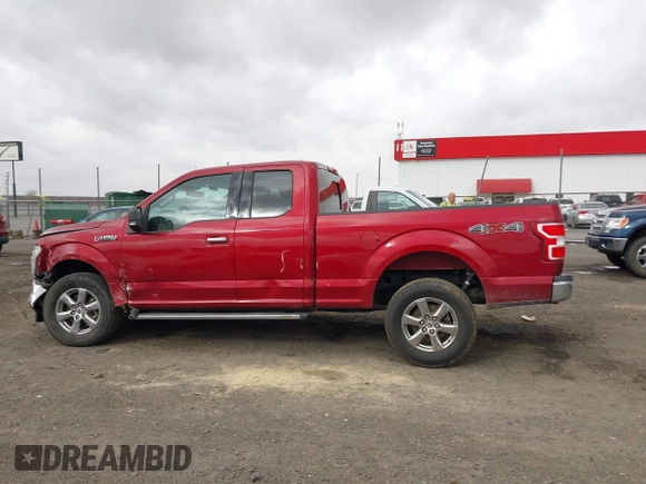 2018 Ford F-150 XL with VIN 1FTFX1E51JKF98962, listed as a IAAI auction lot 41827587 with 128,031 mi miles and . Bid and sale history available at DreamBid. Image 13.