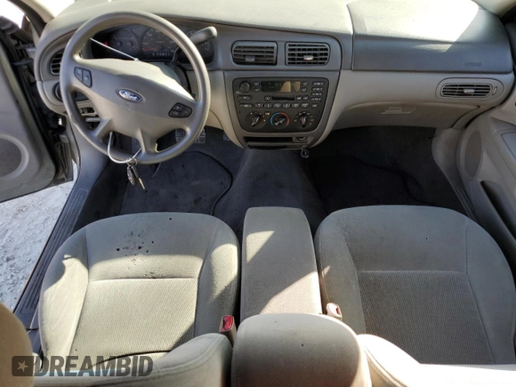 2003 Ford Taurus SE Standard with VIN 1FAFP58U33A259080, listed as a Copart auction lot 86819024 with 143,482 mi miles and Salvage Title. Bid and sale history available at carsss.com. Image 8.