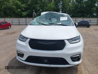 2023 Chrysler Pacifica Touring L with VIN 2C4RC1BGXPR531396, listed as a IAAI auction lot 42492340 with Not provided miles and . Bid and sale history available at DreamBid. Image 12.