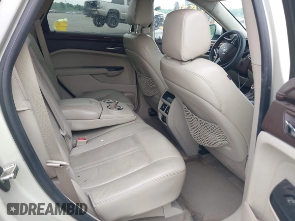 2014 Cadillac SRX Performance Collection z VIN 3GYFNCE35ES610504, wystawiony jako IAAI lot #42133548 z przebiegiem 140 306 mil mil oraz . Historia ofert i sprzedaży dostępna na DreamBid. Obrazek 8.