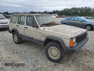 1995 Jeep Cherokee Sport with VIN 1J4FJ68S4SL618773, listed as a Copart auction lot 74126954 with 318,519 mi miles and Salvage title. Bid and sale history available at DreamBid. Image 4.