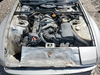1984 Porsche 944 z VIN WP0AA0944EN453698, wystawiony jako Copart lot #59757475 z przebiegiem 17 718 mil mil oraz Szkoda całkowita • Salvage title. Historia ofert i sprzedaży dostępna na DreamBid. Obrazek 11.